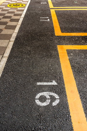Parking lot with yellow line and slot numberの写真素材