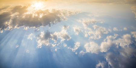 Light of god , sun beam light through the cloud  in blue skyの写真素材