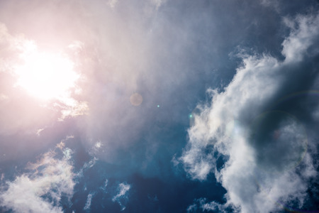 Sun and flare  in clear blue sky without cloudsの写真素材