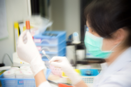 Medical Technologist streak plate for bacteria culture  or identify with biochemical at  microbiology room, Blurred effectedの写真素材