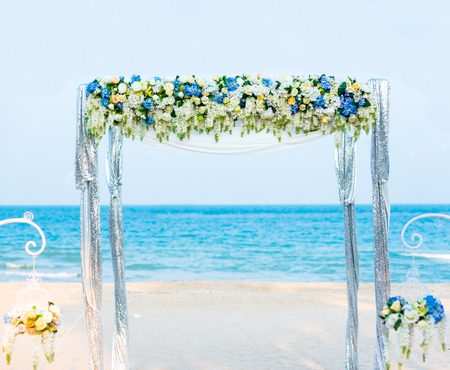 wedding ceremony on the shore of the ocean sea arch on the beach.の写真素材