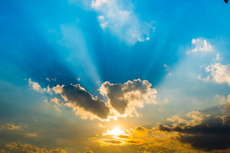 evening sky with sun beam light and cloudの写真素材