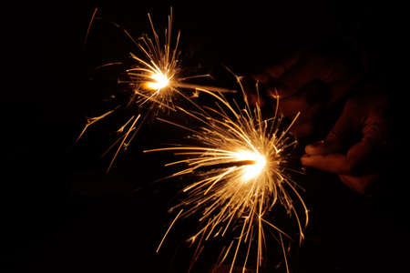 Colourful Crackers in black backgroundの写真素材