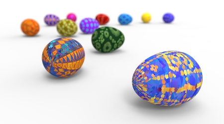 Painted Easter eggs of different colors isolated on backgroundの写真素材