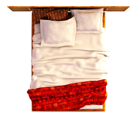 Top view of a bed with a blanket and a pillow isolated on white.の写真素材