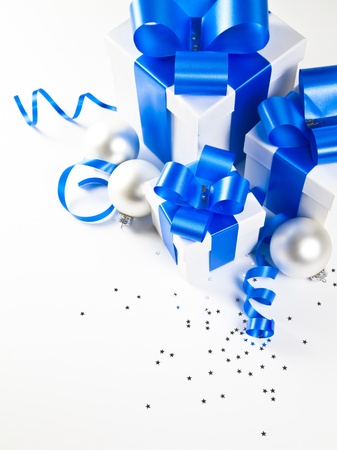 Three gift boxes with christmas decorationsの写真素材