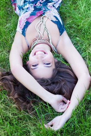 Laughing in the grassの写真素材