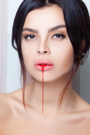 Bloody mouth beauty womanの写真素材