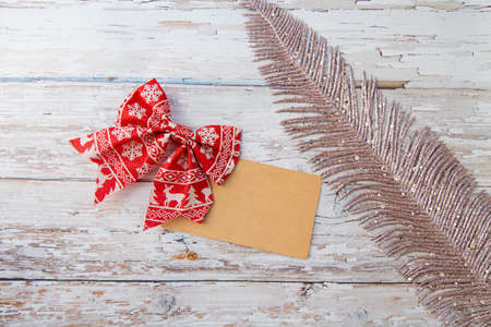 Christmas decorations, a sprig of fir on a wooden background with a place for an inscription