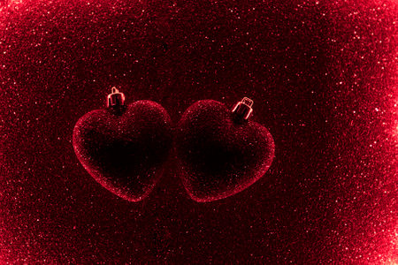 red shiny heart on a red background. background for valentines day. High quality photo