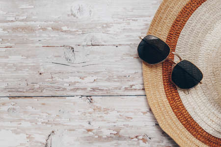 summer hat and sunglasses. summer and tourism concept, beach holiday items. High quality photoの写真素材