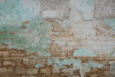 old abandoned building with brick wall and cracked paint. High quality photoの写真素材
