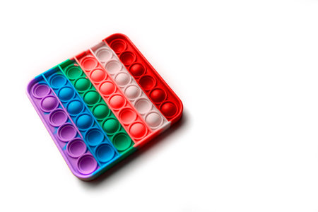 Pop it fidget toy isolated on white background, top view.の写真素材