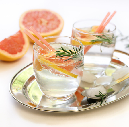 Detox drink with grapefruit, rosemary and ice.の写真素材
