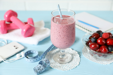 Yogurt with cherries, raspberries, blueberries, healthy sport morning breakfast concept.の写真素材