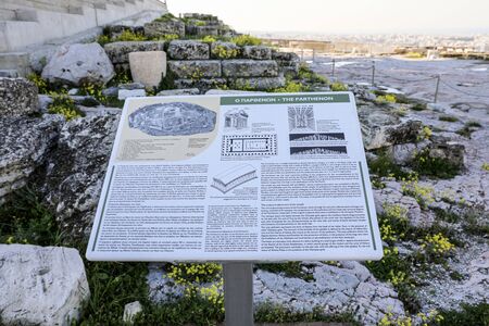 Athens, Greece - March 14, 2017: The information board in front of the Parthenon temple on the Acropolis of Athens, Greece. Horizontal. Close-up.のeditorial素材