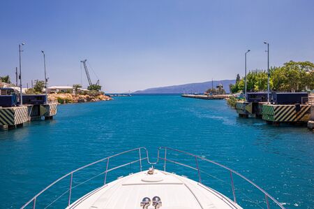 Passing through the Corinth Canal by yacht, Greece.の写真素材