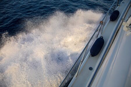 Summer morning traveling by yacht in the Saronic Gulf, Greece. Horizontal.
