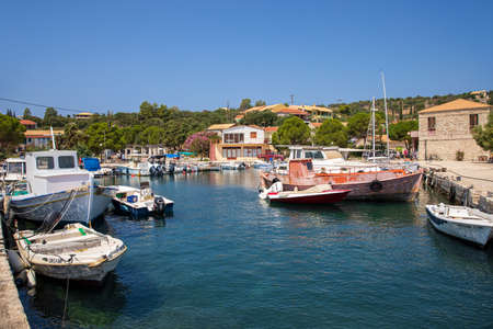 KASTOS island, GREECE-August,2019: Part of small port of Kastos island with moored boats - Ionian sea, Greece in summer sunny day.のeditorial素材