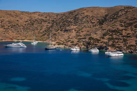 Yachts anchored off the coast of Kythnos island, Kolona beach, Cyclades-Greece in June, 2021.のeditorial素材