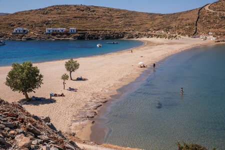 KYTHNOS, GREECE - JUNE, 2021. Beautiful landscape of the Kolona double sided beach at Kythnos island in the morning at the beginning of the tourist season.のeditorial素材