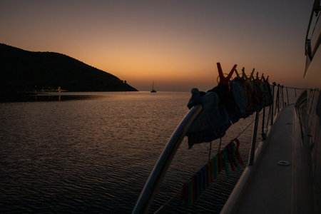 Before sunrise in Agia Kyriaki beach, Kyparissi Laconia, Peloponnese, Zorakas Bay, Greece in summer view from yacht.の写真素材