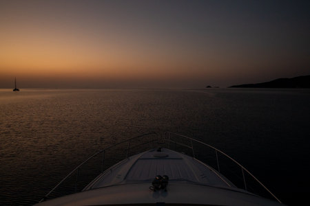 Before sunrise in Agia Kyriaki beach, Kyparissi Laconia, Peloponnese, Zorakas Bay, Greece in summer view from yacht.の写真素材