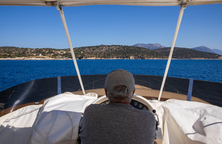 Traveling by sea to the destination KASTOS island, Lefkada Regional unit, Ionian Islands, Greece in summer.の写真素材