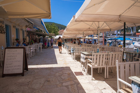 FISKARDO village, GREECE - July, 2020: Fiskardo village marina with taverns and small shops in summer sunny day.のeditorial素材