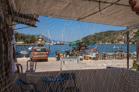 Vathy town, Meganisi island, Ionian Sea, GREECE-JULY 30, 2023.のeditorial素材