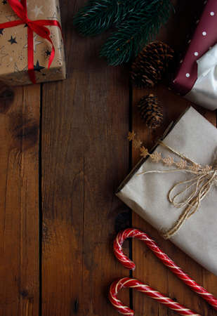 Christmas and New Year holiday background. Christmas gifts on wooden background top view. Flat layの写真素材