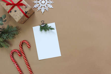 Christmas greeting card template. Empty paper mock up. New year flat lay, top view, copy spaceの写真素材