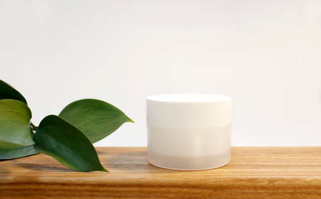 Cosmetic cream for care. Flat lay, top view.