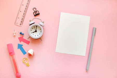 School supples frame on pink background. Flat lay, top view colorful stationery. Back to school banner mockup.の写真素材