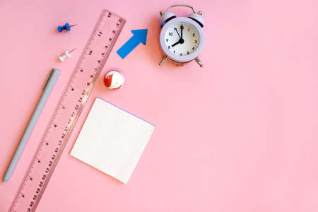 School supples frame on pink background. Flat lay, top view colorful stationery. Back to school banner mockup.の写真素材