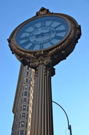 The 5th Avenue Clock and the Flatiron Building - a NYC landmark over 100yrs old, in 1902 was one of...