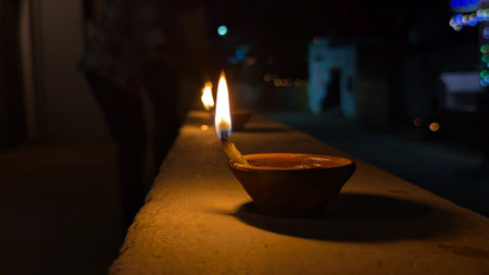 Candle light in the dark. Diwali or Deepawali celebration.の写真素材