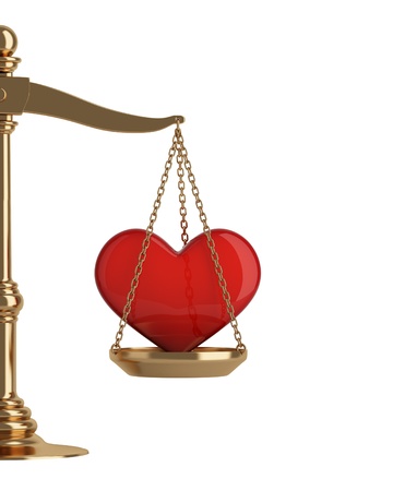 Gold scales with heart の写真素材