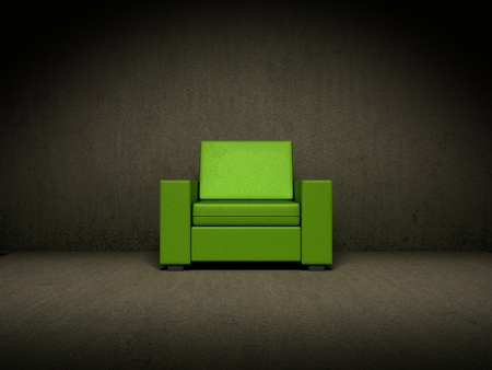 Green chair in dark roomの写真素材