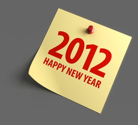 Happy new year 2012 message on notepad paperの写真素材