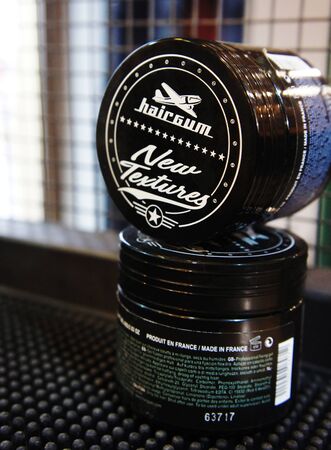 pomade strong firme hold. trendy barbershop styling. gel for male styling - hairgum.のeditorial素材