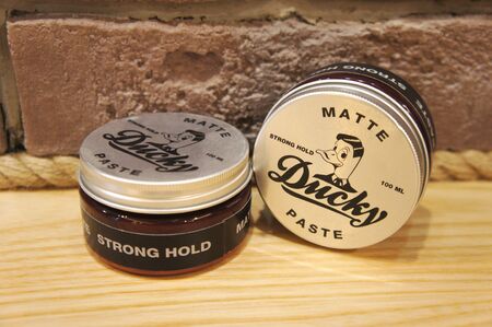 men hairstyle. ducky matte paste. paste for men barber shop.のeditorial素材