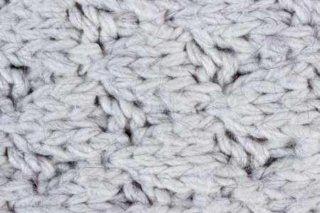 Texture of white warm knitted sweater close up.の写真素材