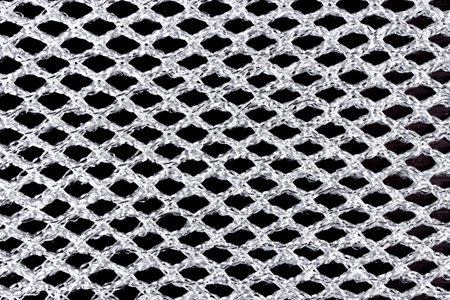 Texture of silver acrylic fabric in mesh close-up.の写真素材