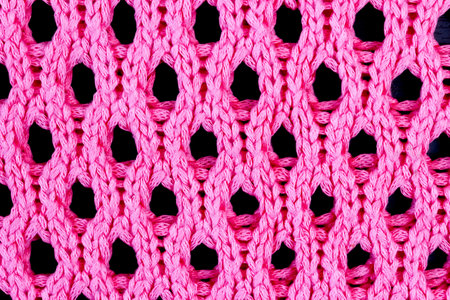 Openwork mesh pink fabric for background.の写真素材