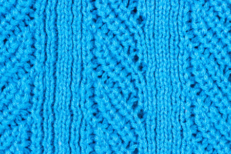 Blue knitted fabric with coarse knitting. texture and background.の写真素材