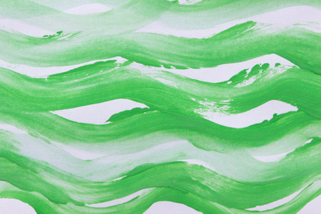 abstract painting. Bright green wavy lines on white paper with a watercolor brush. background design.の写真素材