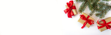 Festive gift boxes with spruce branches on a white background. The concept of New Year and Christmas. flatlay. copyspace. postcard.の写真素材