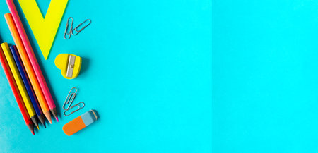 school supplies on a blue background. Space for text.の写真素材