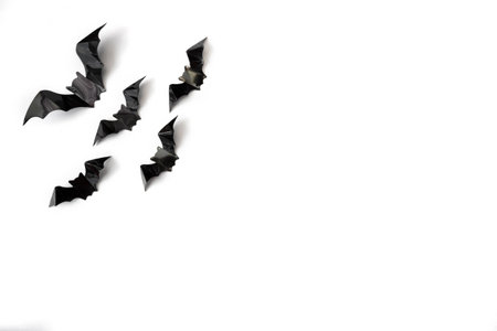 Halloween holiday. Flatly on a white background. Postcard with bats. copyspace.の写真素材